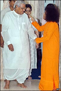 Sri Satya Sai Baba, (right) blesses former Indian prime minister Vajpayee (left) in  April 2004